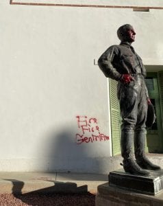John Greenway statue painted with red spray paint outside Arizona History Museum